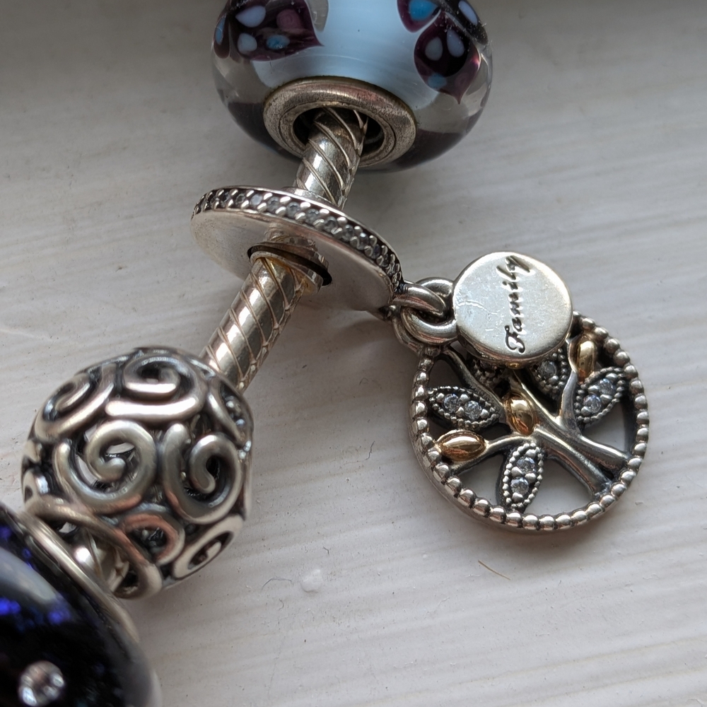 Pandora Bracelet with Charms: Blue Glass and Silver Floral Accents - Picture 3 of 7